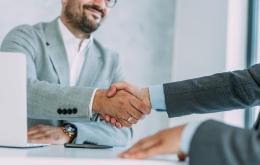 lawyer shaking hands with the client